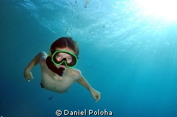 Young freediver descending by Daniel Poloha 